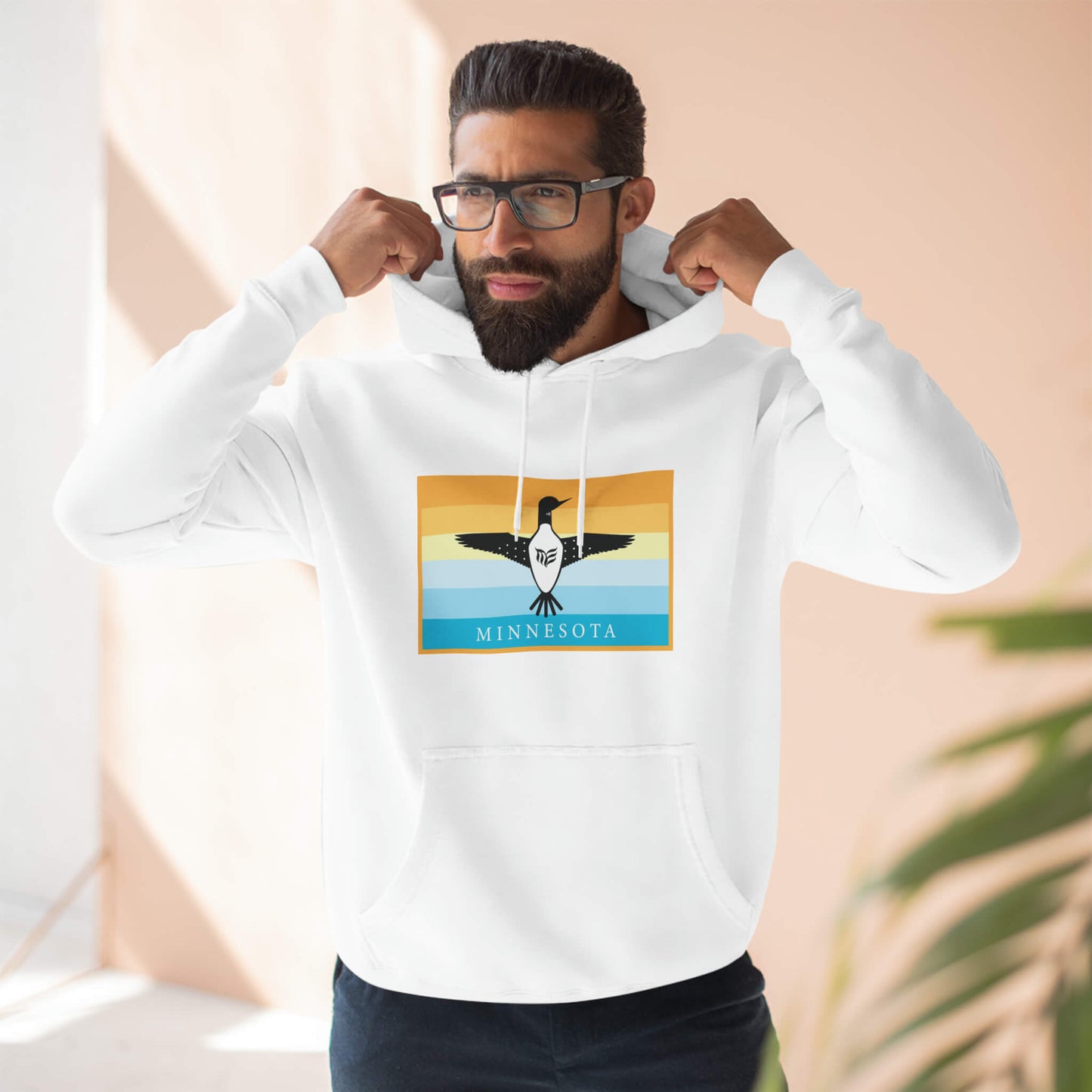 Modern Envy Loon White hoodie lifestyle image with male model