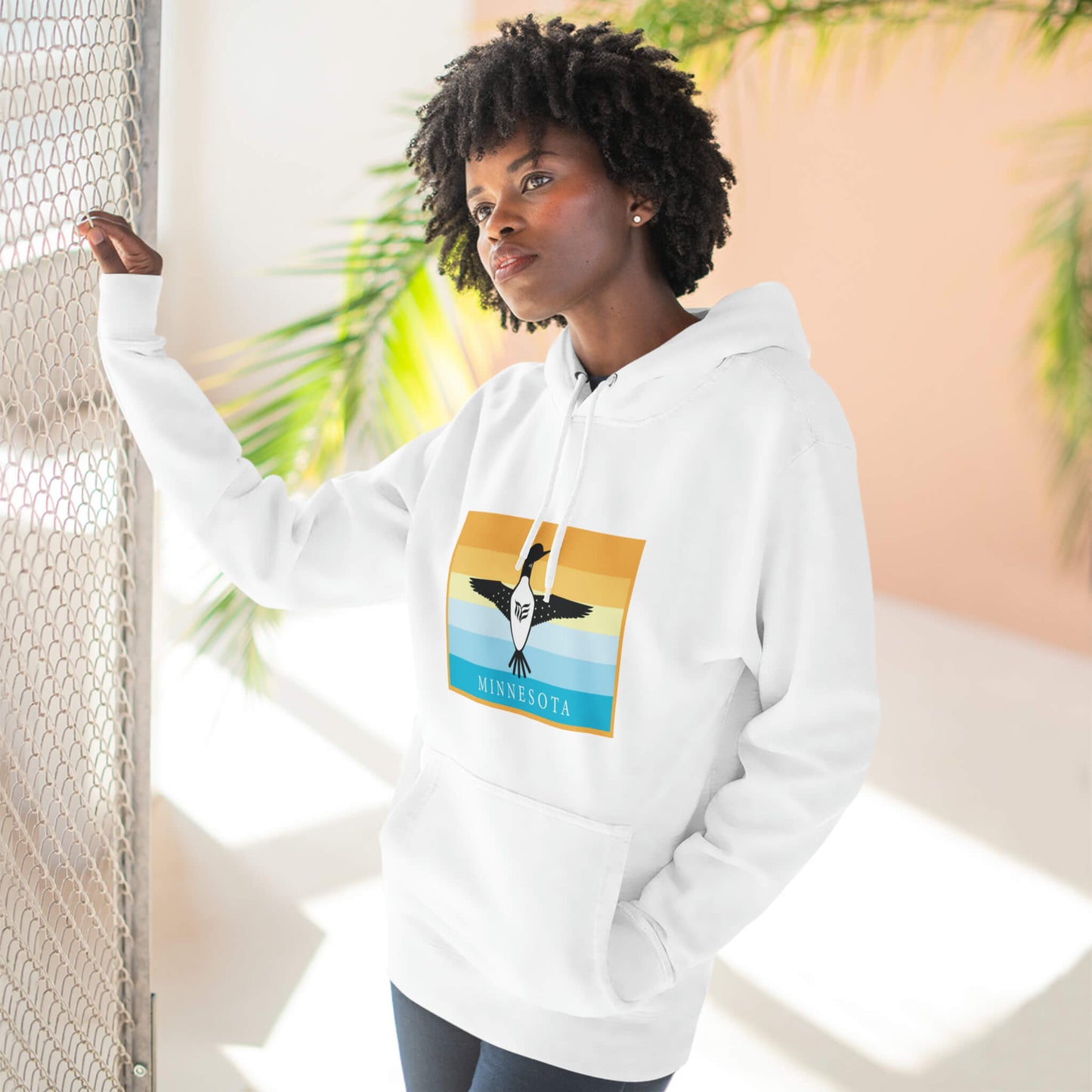 Modern Envy Loon White hoodie lifestyle image with female model