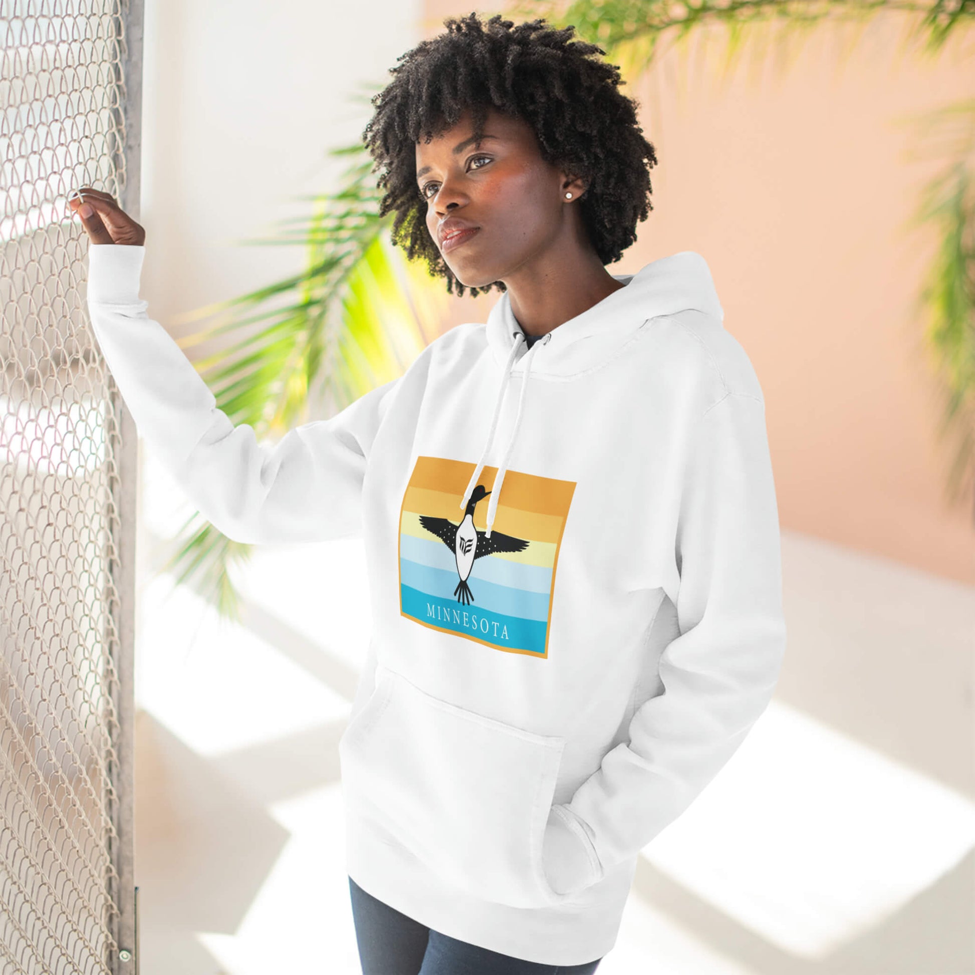 Modern Envy Loon White hoodie lifestyle image with female model