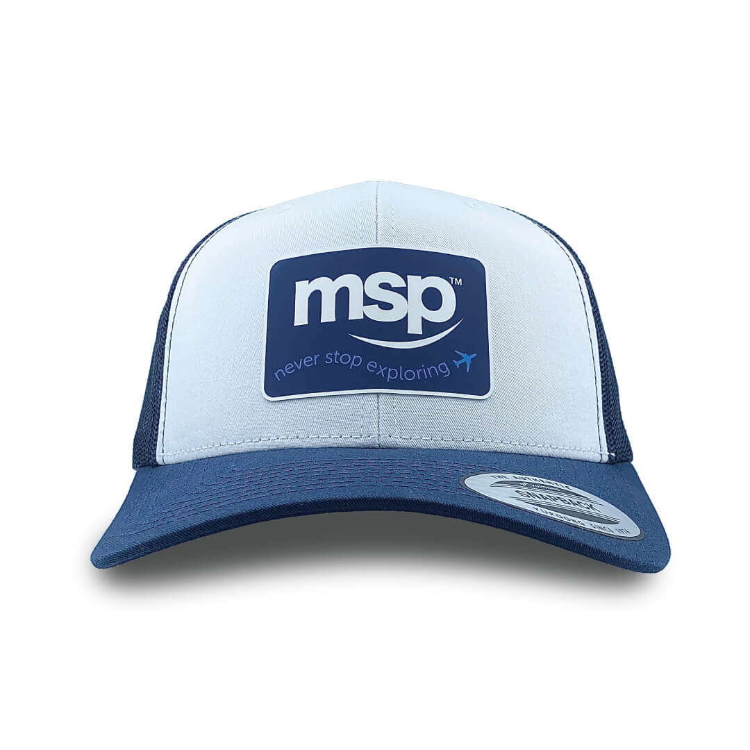 MSP White/Navy 6 panel featuring the Never Stop Exploring Silicone Patch