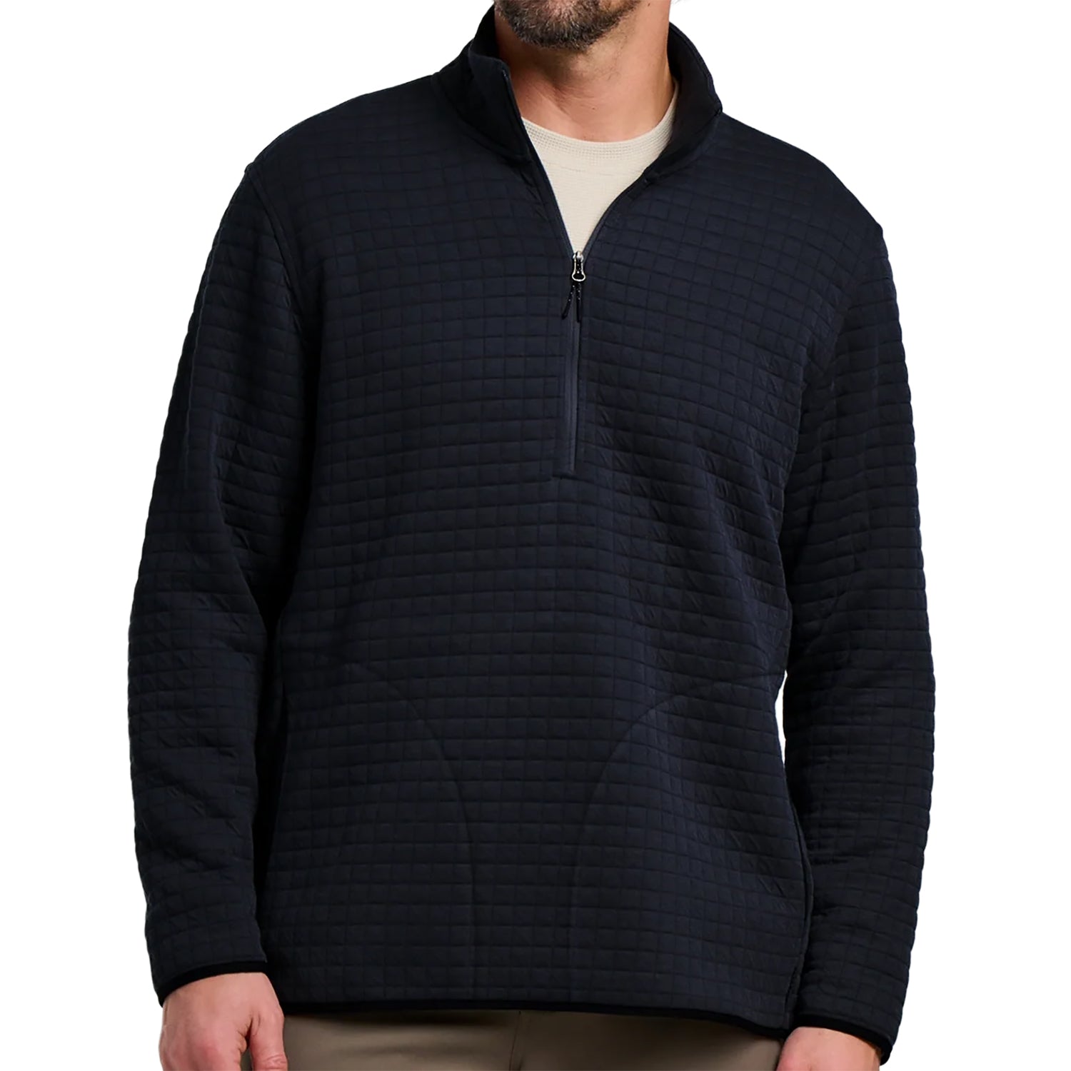 Man wearing a black textured pullover on a white background