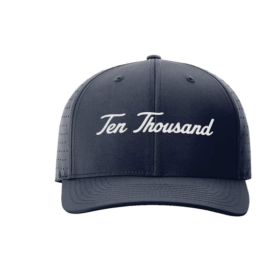 A dark navy blue baseball cap with white embroidered text reading 'Ten Thousand' on the front, shown against a plain white background.